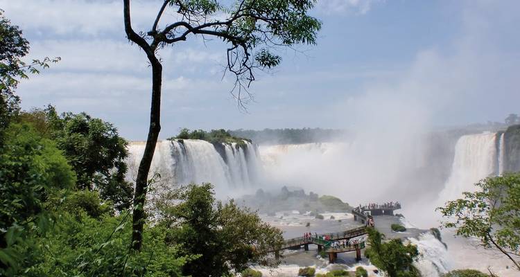 Panoramic view of Iguazu Falls with a viewing platform