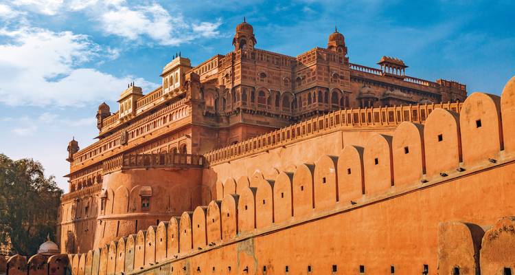 Massive historic fort under a blue sky