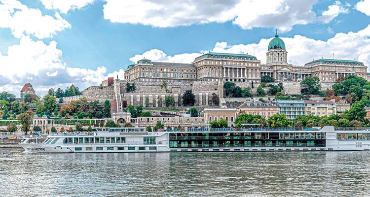 Cruise ship passing by Buda Castle in Budapest.