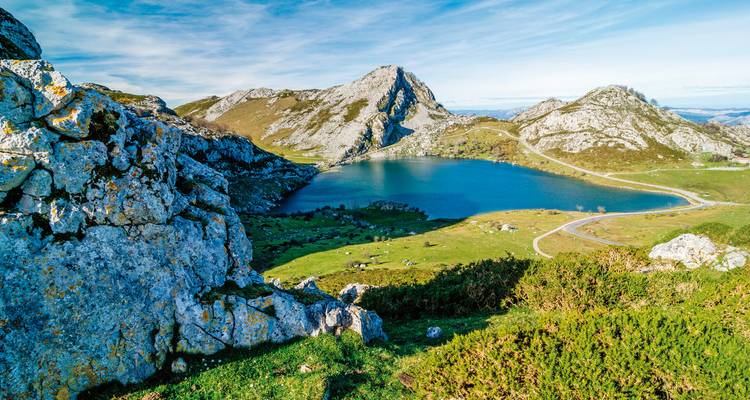 Mountainous landscape with a deep blue lake.