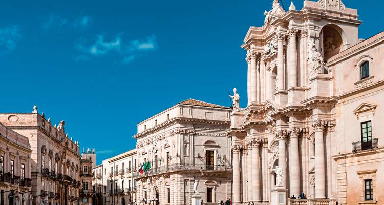 Historic Italian street with baroque architecture.