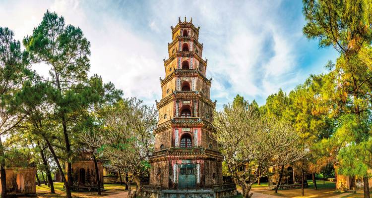 Thien Mu Pagoda surrounded by trees in Hue, Vietnam