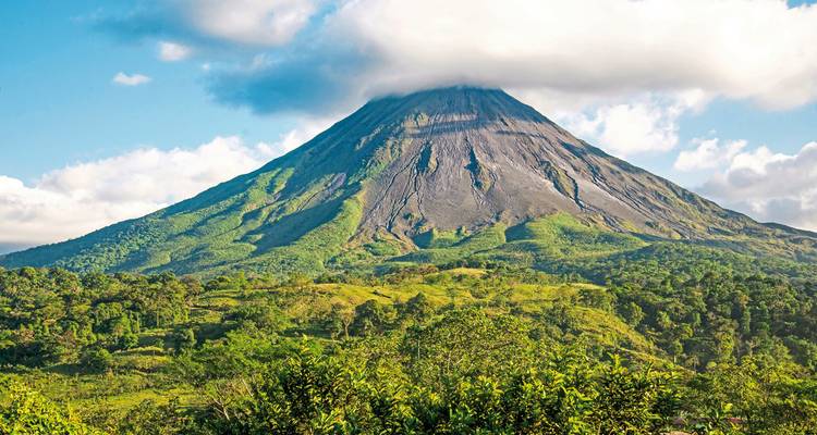 Mountain with a cloud cover at the peak.