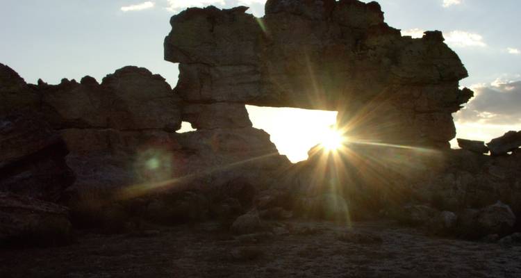Rocks with a natural window at sunset.