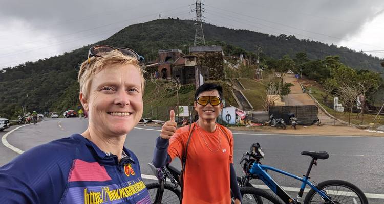 Cyclists at a mountainous location in Vietnam.