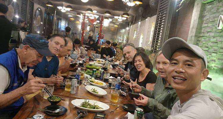 Group enjoying a meal together indoors.