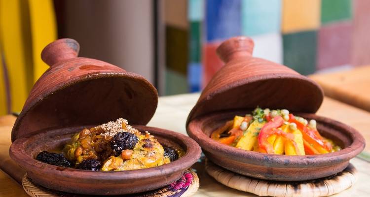 Two traditional Moroccan tagine dishes with colorful backgrounds.