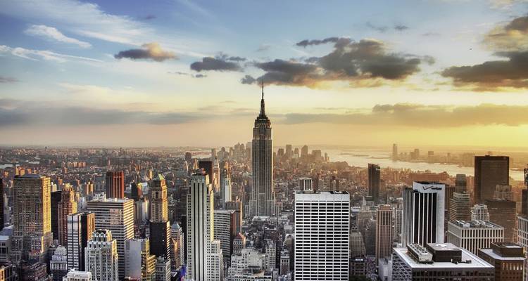 City skyline during sunset with landmark building