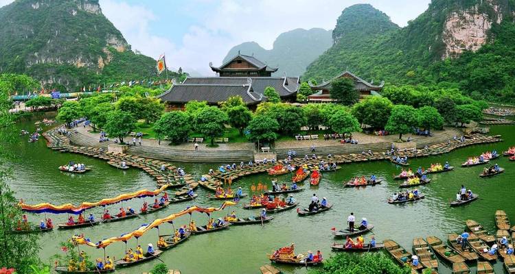 Busy riverscape with many boats and a vibrant atmosphere.