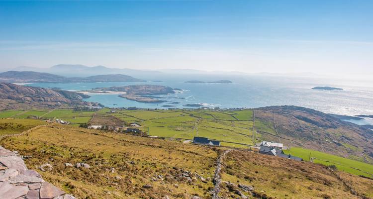 Panoramic view of a coastal region with islands and peninsulas.