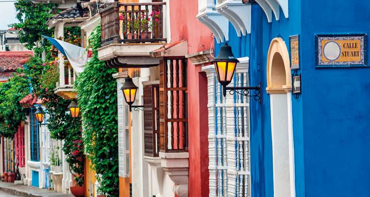 Colorful colonial-style facades on a street.