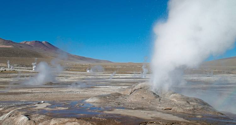 Geothermal activity with steam rising.