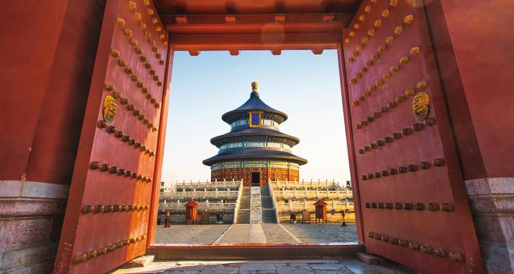 Temple of Heaven framed by large red doors.