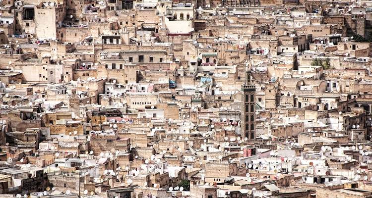 Busy cityscape with traditional Moroccan architecture.