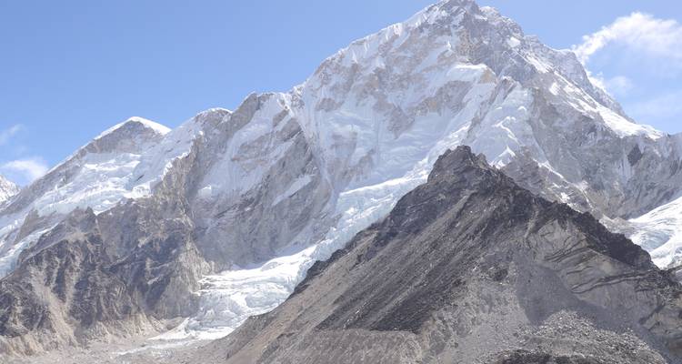 Impressive view of snow-covered peaks under a bright sky.