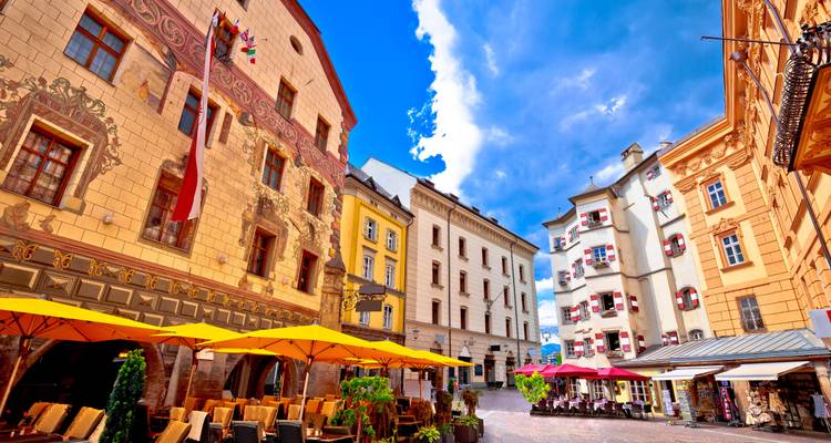 Colorful buildings in a European town square.
