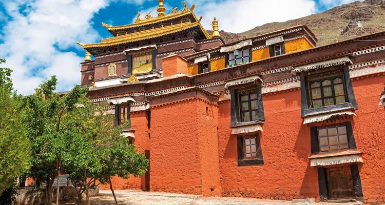 Colorful Tibetan monastery with detailed architecture.