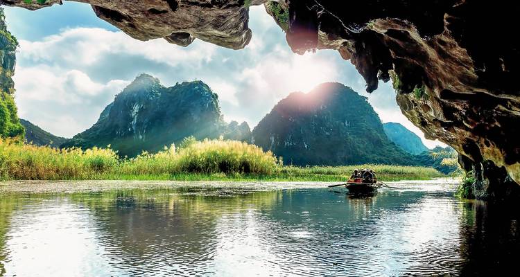Scenic river with karst mountains in the background.