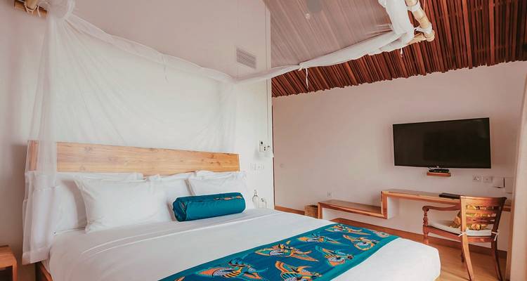 Luxury hotel room with modern decor.