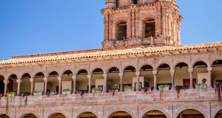 Colonial architecture with arched balconies.
