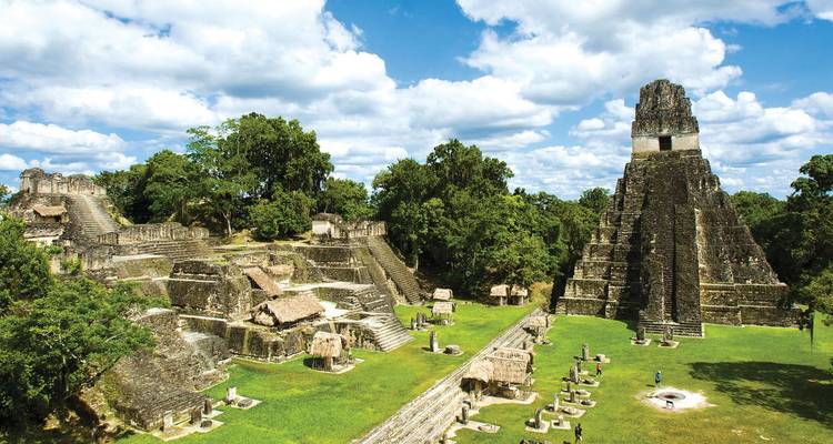 Ancient Mayan ruins of Tikal surrounded by jungle.