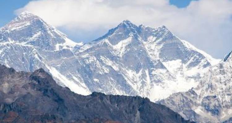 Snowy mountain peaks viewed from a distance.
