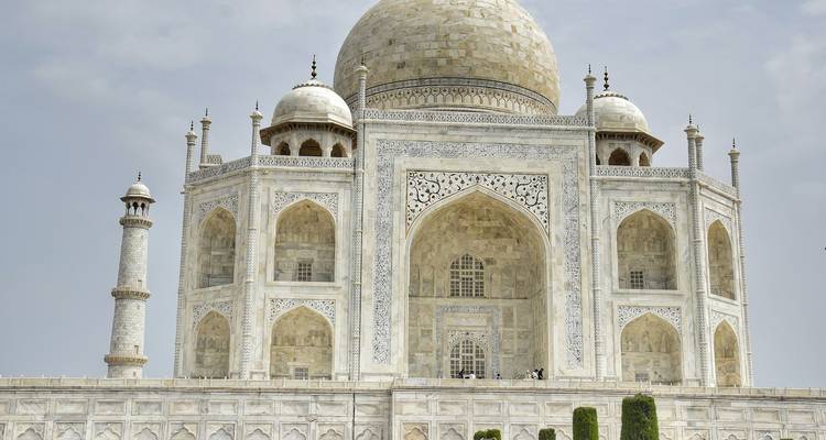 Taj Mahal with detailed marble carvings.