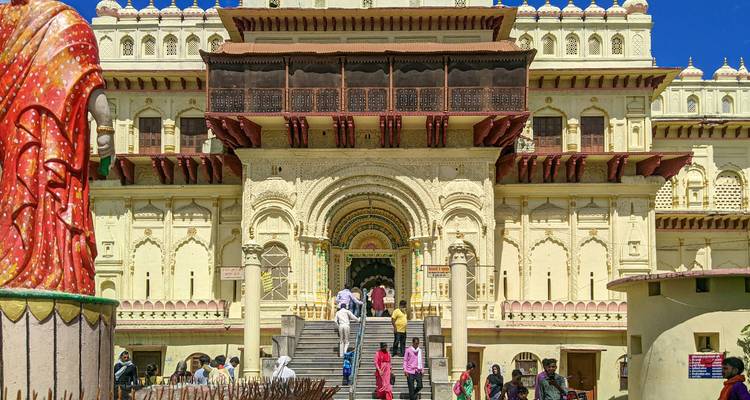A grand temple entrance with detailed carvings and steps.