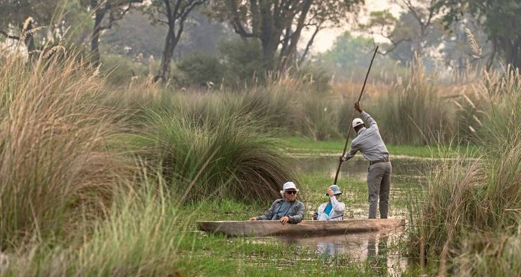 People in a traditional canoe exploring a waterway