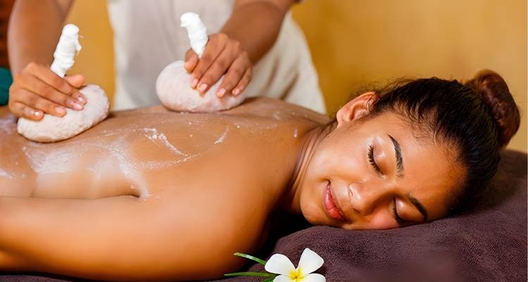 Person receiving a relaxing spa treatment.