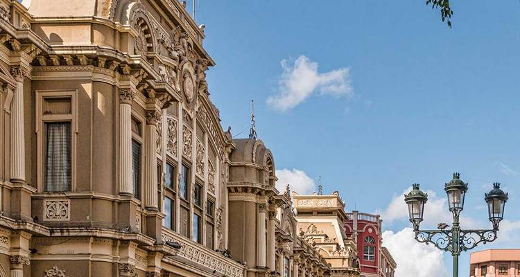 Ornate historic building façade against a blue sky.