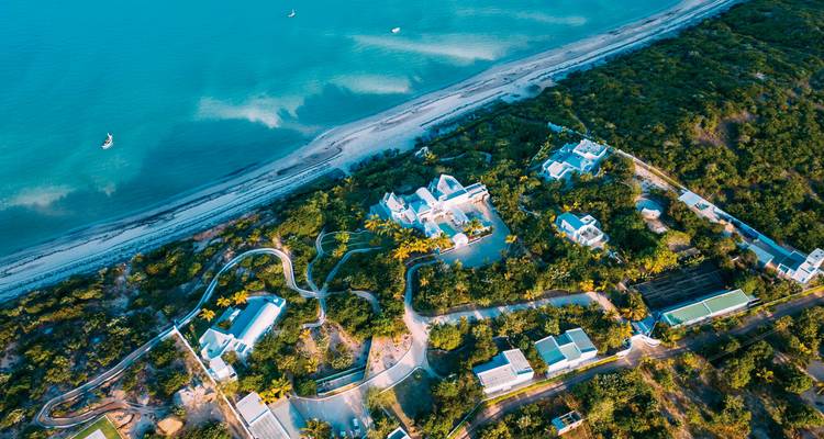 Aerial view of luxury beachside resort.