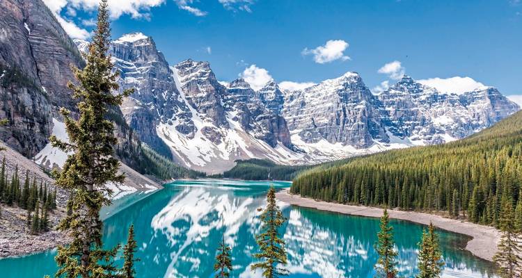 Moraine Lake with turquoise waters surrounded by mountains.