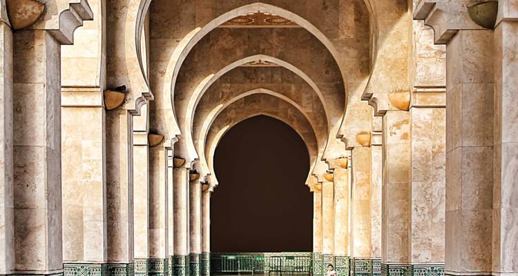 Ornate arches of a mosque interior.