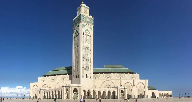 Hassan II Mosque with a clear blue sky.
