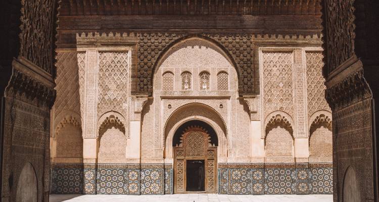 An ornate architectural facade with intricate tile work.
