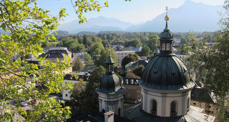 Scenic view of a central European city with a church dome.