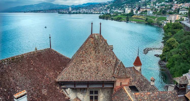 Aerial view of a picturesque town by a lake.