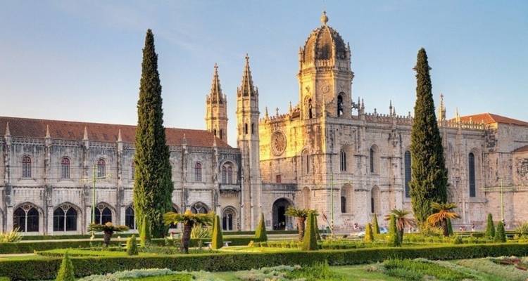 Jerónimos Monastery with a garden in the foreground