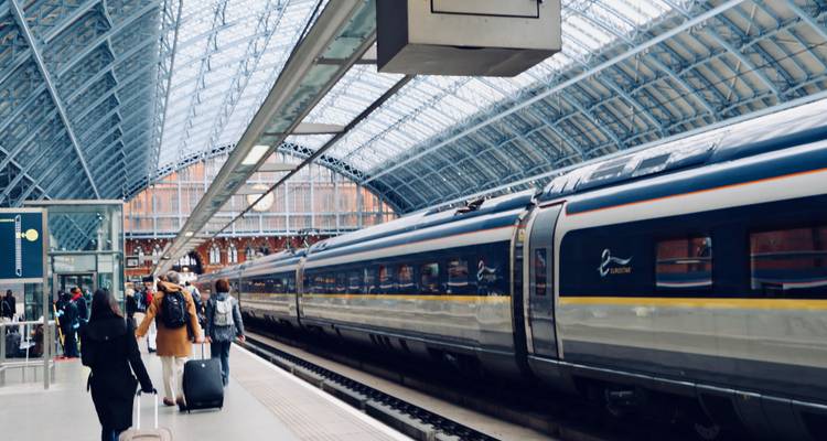 Train station platform with a modern train.