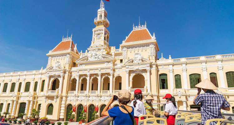 Tourists admiring a historic government building.