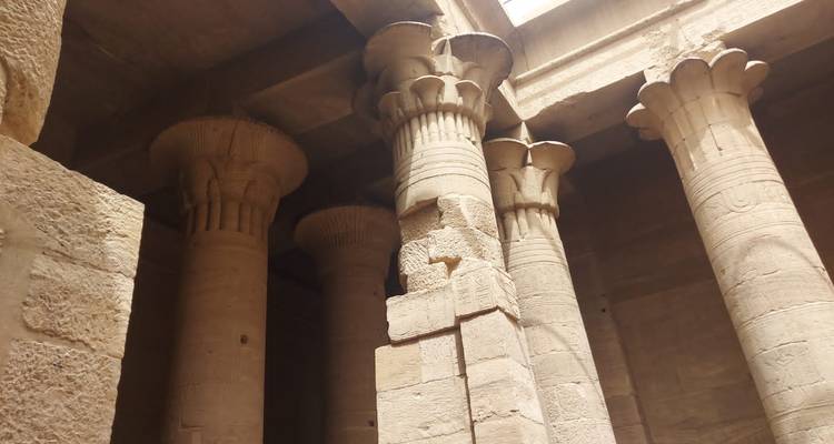 Interior of an ancient temple with tall columns.