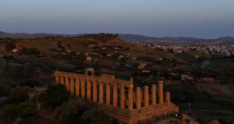 Ruins of an ancient temple at dusk.