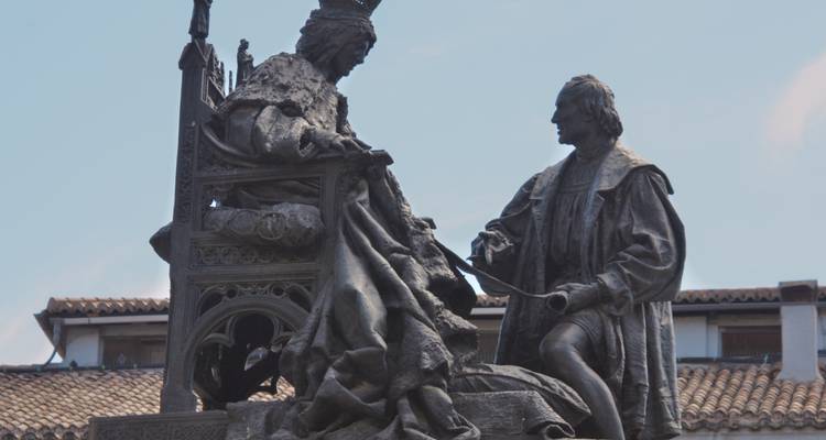 Statue of two historical figures in a classical pose.