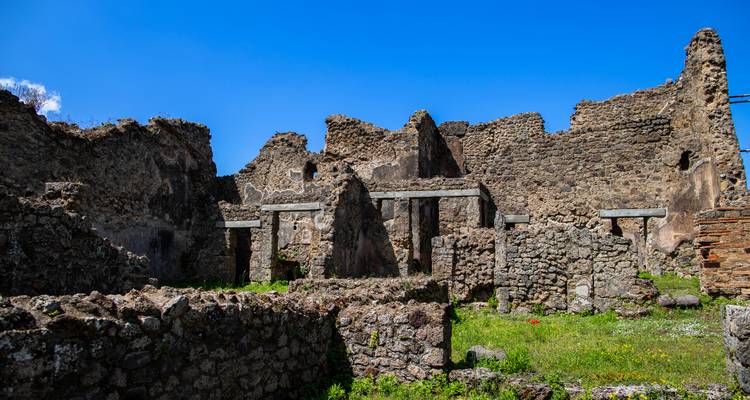 Detailed view of ancient ruins and stone walls in Pompeii.