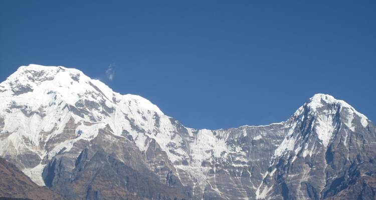 Snowy peaks under a clear sky.
