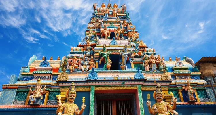 Ornate colorful temple facade with detailed carvings.