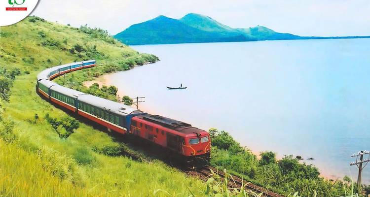 Train traveling along a scenic coast.