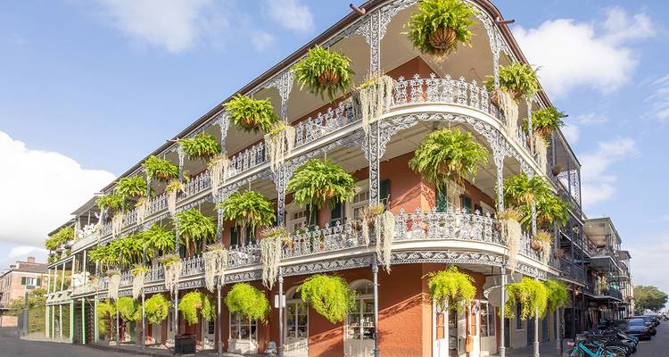 Historic building with ornate balconies in New Orleans.