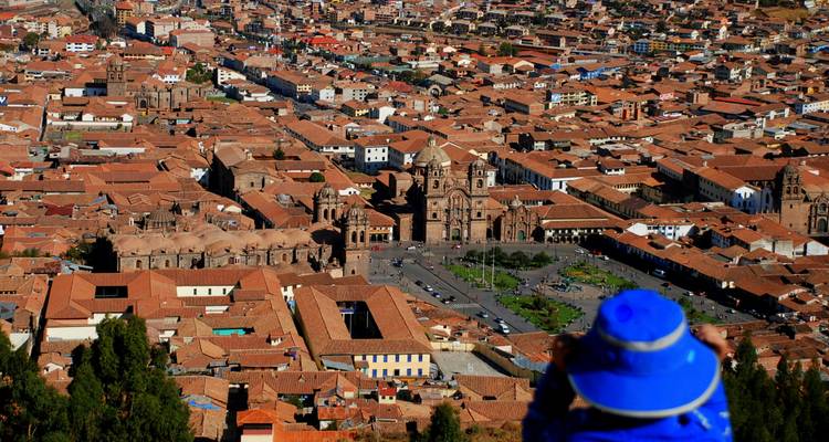 Aerial view of a city with a woman in traditional clothing.